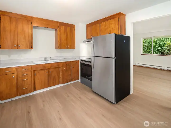 New refrigerator, electric range and hood