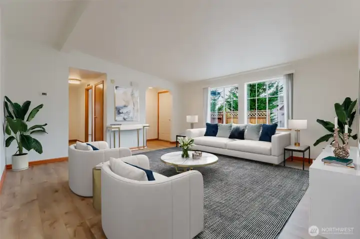 Living room, hallway to bedrooms and bathroom on the left. Main entrance and coat closet to the right.