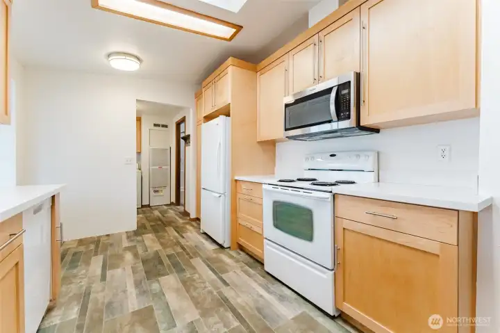 Kitchen looking towards laundry/entrance.