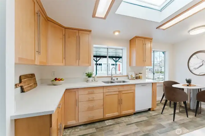 Lots of natural light in kitchen with eat-in area.