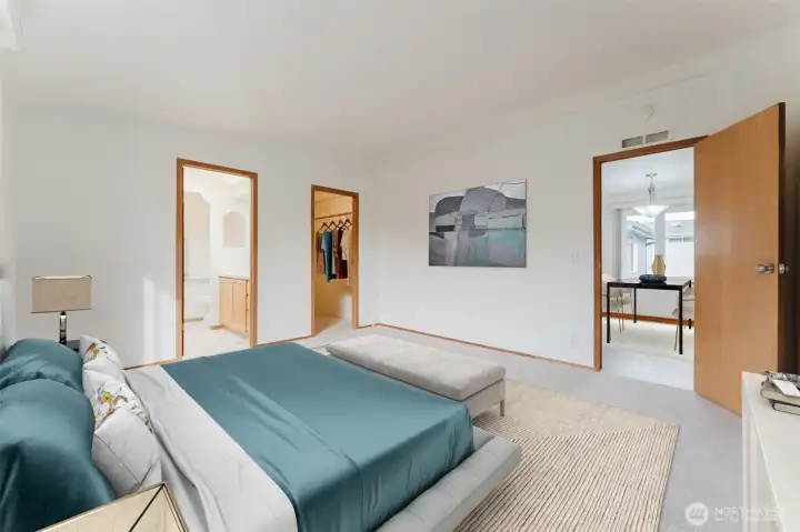 Primary bedroom has walk-in closet and and ensuite bathroom.