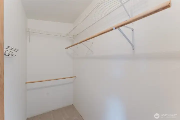 Walk-in closet in primary bedroom