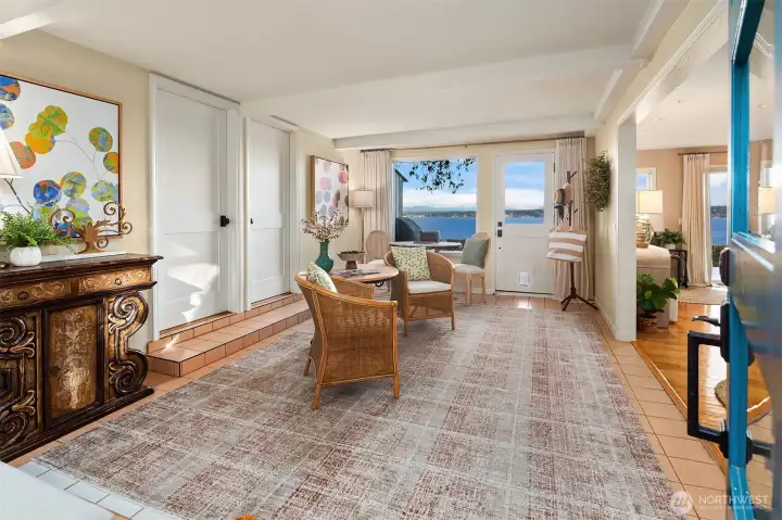 Tile entry for easy maintenance blends into warm hardwood flooring.