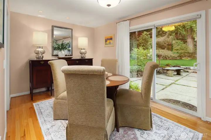 Dining area with direct outdoor access to patio for extended entertaining or family space.