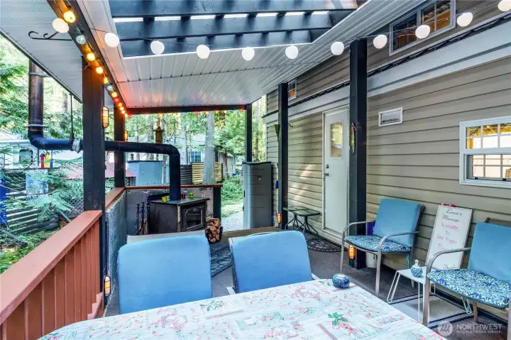 Deck seating area w/ wood stove.
