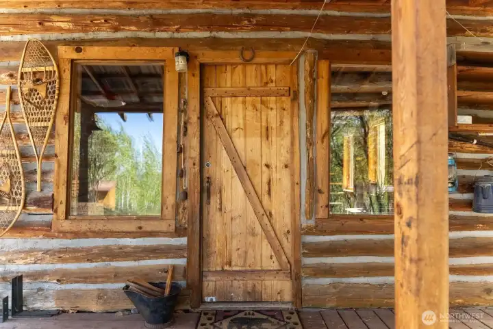 Genuine off-grid log cabin front door.