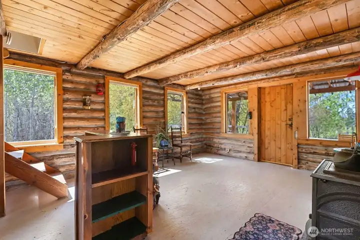 Stairs take you up to Loft Primary Bed and shower ensuite. 320 sf main level.