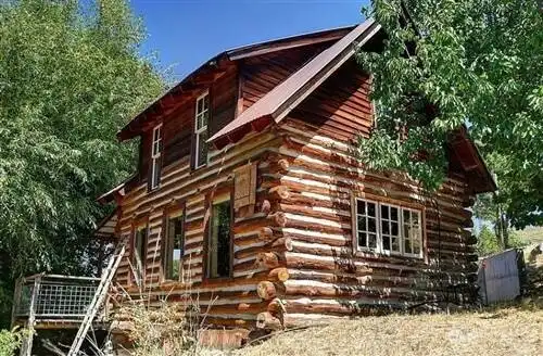Rustic Log Cabin on 35 Acres is a homesteaders dream!