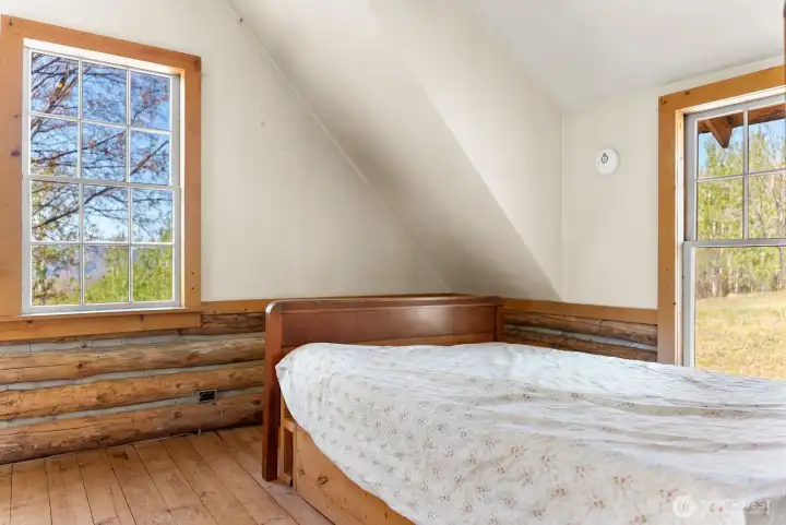 Loft bedroom enjoys lots of natural light.