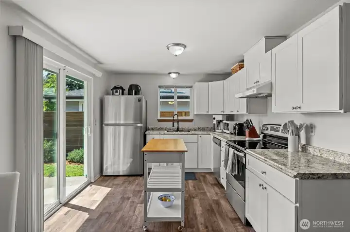 Updated kitchen with easy access to backyard