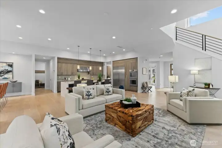 Open, airy, and beautifully connected, the open-concept great room, chef’s kitchen, and dining area create a seamless layout for cooking, conversation, gathering, and everyday living in this Kirkland North Rose Hill luxury home.