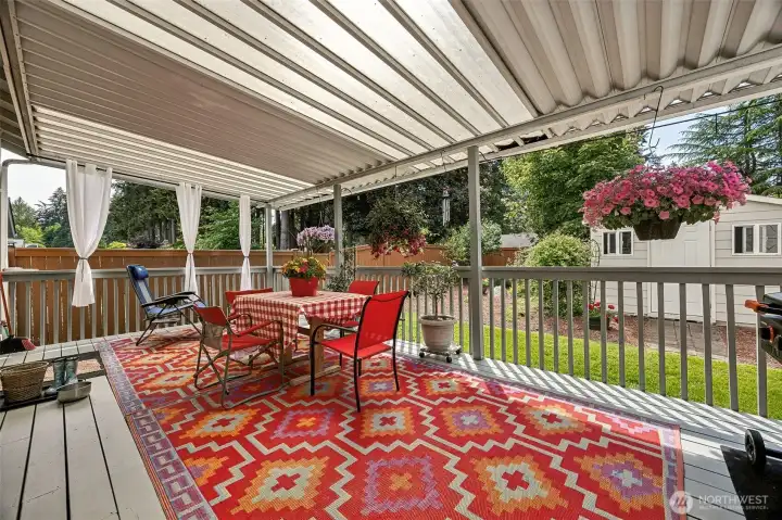 A great spot to sit & enjoy beautiful landscaping & private back yard.