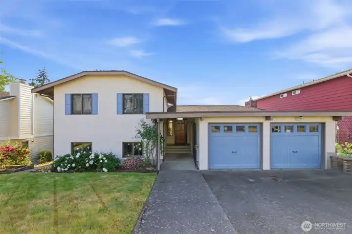 4 bed 3 bath with 2 car garage and off street parking.