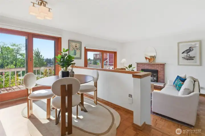 Dining space flows into sunken living room.