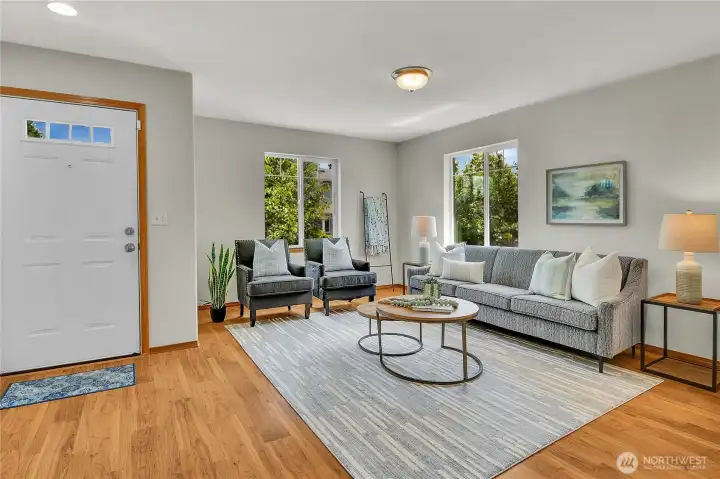 Formal living room off entry with hardwood floors. New interior paint throughout! Formal living room off entry with hardwood floors. New interior paint throughout!