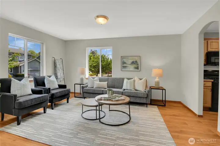 Formal living room off entry with hardwood floors. New interior paint throughout! Formal living room off entry with hardwood floors. New interior paint throughout!