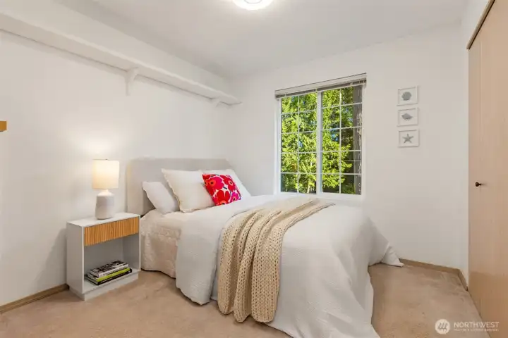 Second bedroom with calming views of the greenery. Second bedroom with calming views of the greenery.