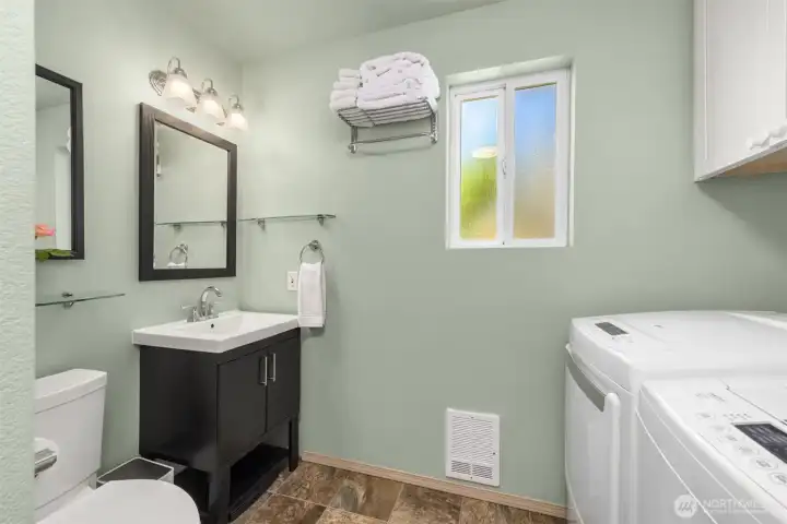 The efficient lower-level utility area, complete with a ¾ bath, offers generous space and flexibility for a variety of needs. The efficient lower-level utility area, complete with a ¾ bath, offers generous space and flexibility for a variety of needs.