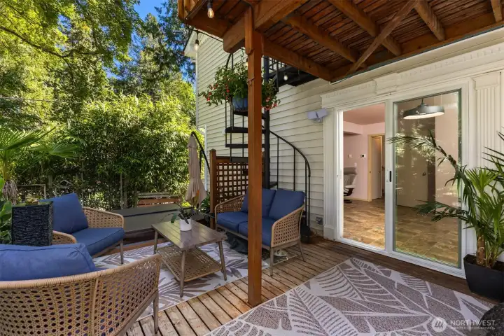 Take the spiral staircase to the upper level deck. Take the spiral staircase to the upper level deck.