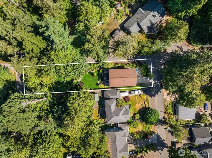 This property is on a double lot, providing added privacy, mature landscaping, and a peaceful sense of seclusion. This property is on a double lot, providing added privacy, mature landscaping, and a peaceful sense of seclusion.
