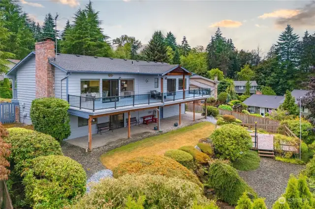 Celebrate every season on the full length back deck with covered pergola and the full length, waterproof patio below.