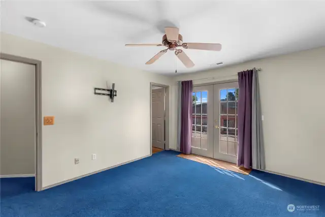 Second Primary bedroom with attached bathroom and with French doors leading to outside deck