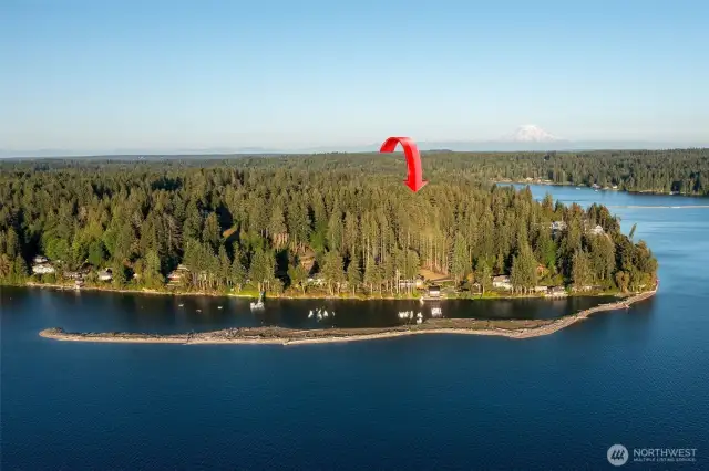 Located within 15 minutes from downtown Gig Harbor WA this unique west facing 5.4 acre estate is located on a protected cove and included moorage for small boat craft.