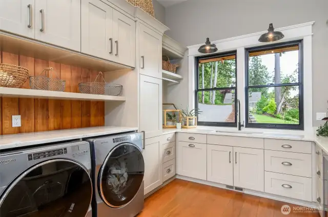 Whether prepping for a grand event or handling daily chores, this room does it all with grace and efficiency, all while offering views of the Puget Sound's tranquil beauty.