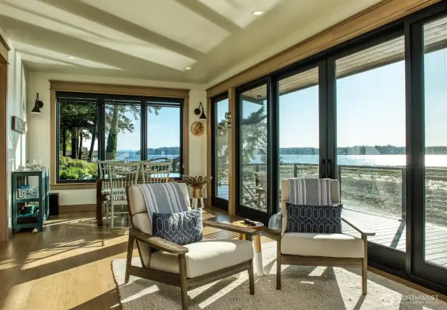 Step inside this serene guest cabana beach house retreat, where the panoramic views of Puget Sound become a part of your everyday. Elegant simplicity meets coastal charm, offering a haven where every window presents a postcard-worthy scene.