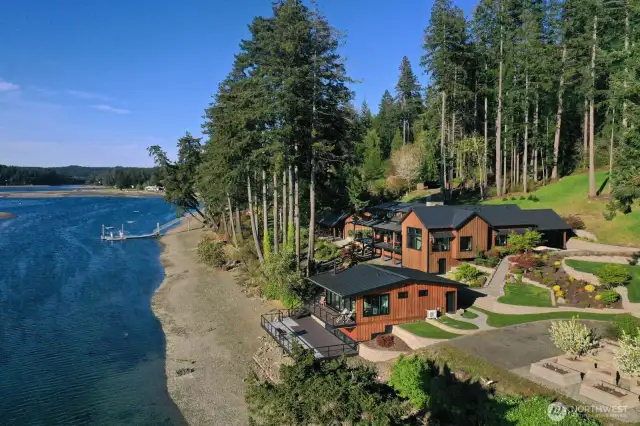 Five-acre low-bank waterfront estate is completely fenced and gated with a private cove for protected moorage.