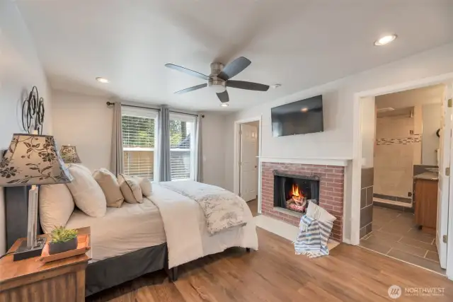 Large primary bedroom with en-suite, gas fireplace and large walk in closet.