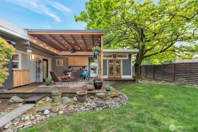 Outdoor covered patio and detached office space.