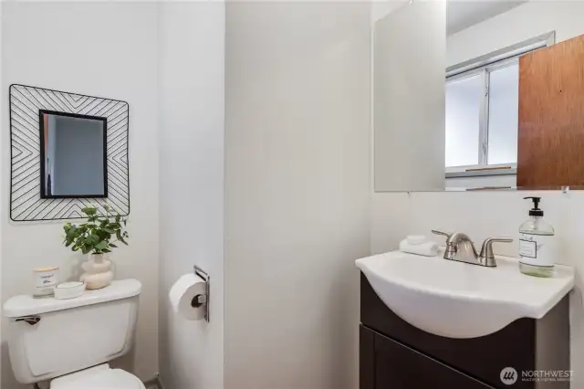 Shown here is the half bath just off the third bedroom.