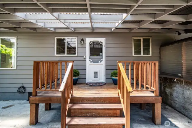 The deck has room for a bench or potted plants.