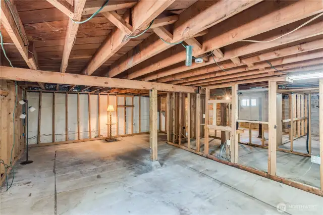 A door from the outside leads down into the unfinished basement, which is a spacious 1,310 sq ft.