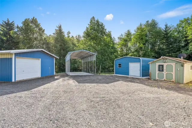 Detached garage, RV Cover, small outbuilding and shed.
