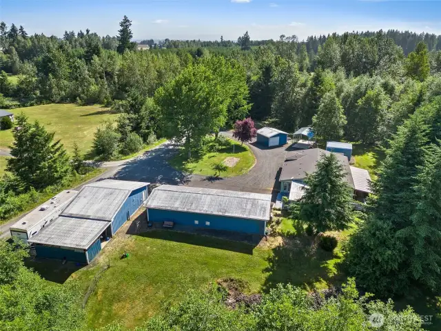 Aerial View of shops, yard, and home.