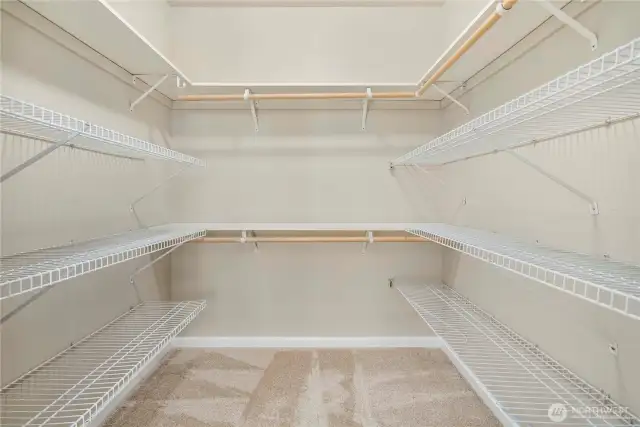 Organize with ease in this oversized walk-in closet