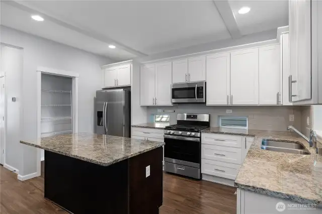 Open kitchen with walk-in pantry
