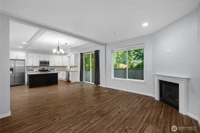 Open concept living room with high ceilings