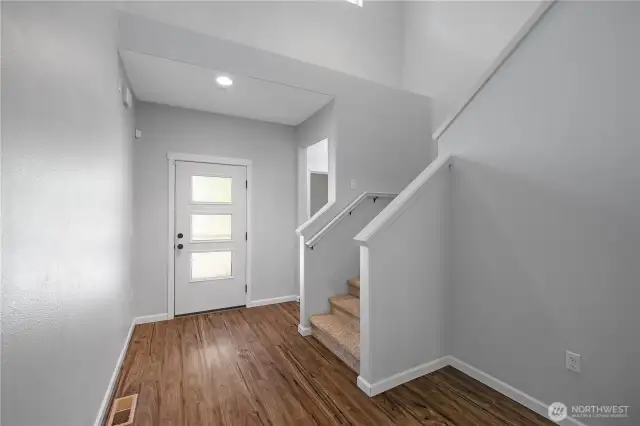 Entryway and staircase. 1/2 bath to right of front door.
