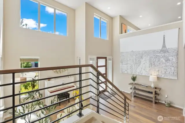 Two-story foyer and living room.