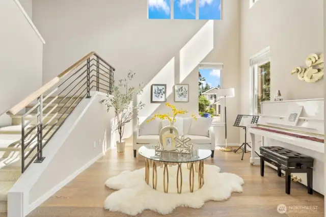 Formal living room with soaring 2-story ceiling.