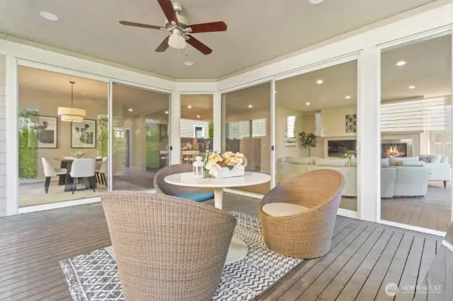 Outdoor room with ceiling fan and ceiling lights.