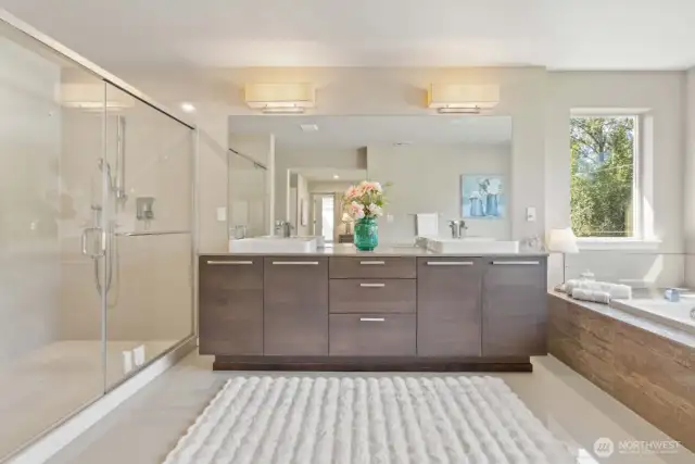 Luxurious primary bath with huge walk-in shower.