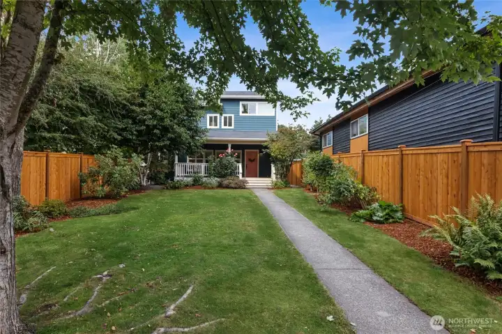 This is the walkup, through a spacious, flat, parklike lot. Room for all kinds of activities, or perhaps another dwelling.