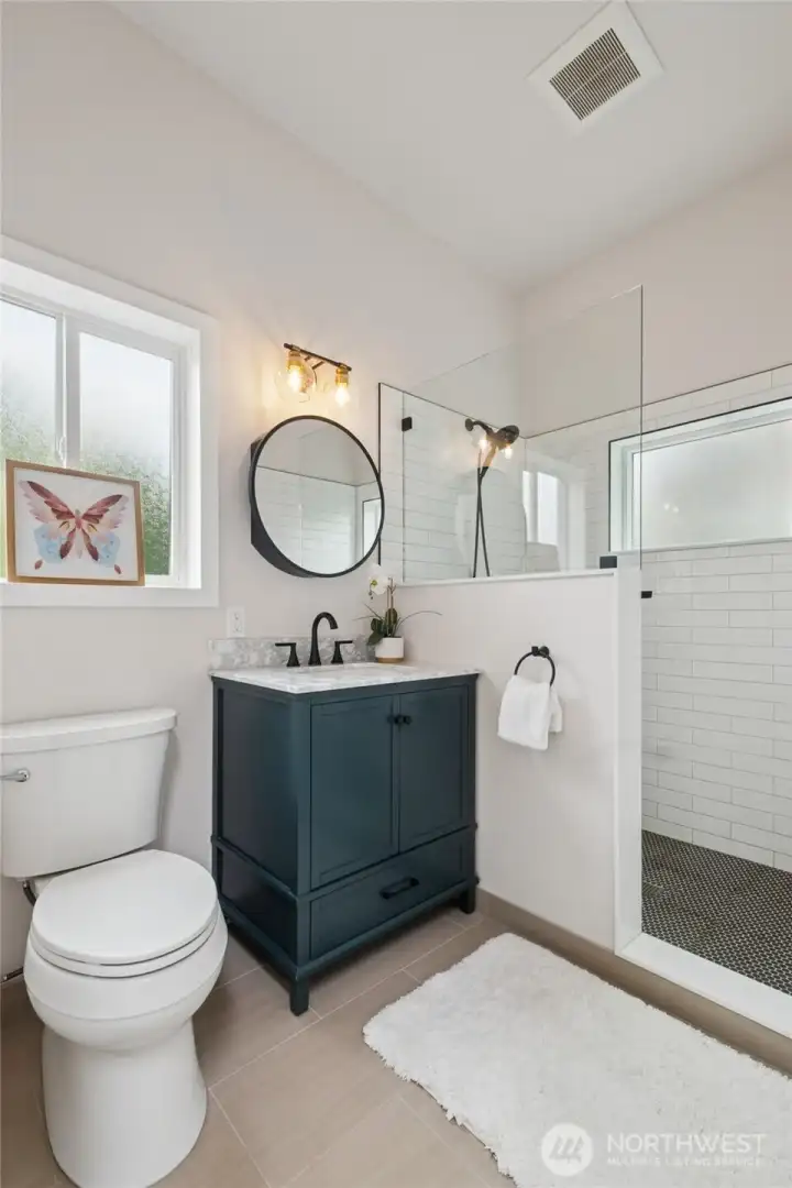 Upper bathroom remodeled in 2024.
