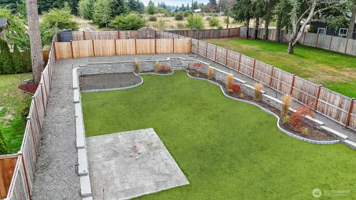 The original owners have designed the tiered landscaping provides so many areas to play, entertain, or relax!