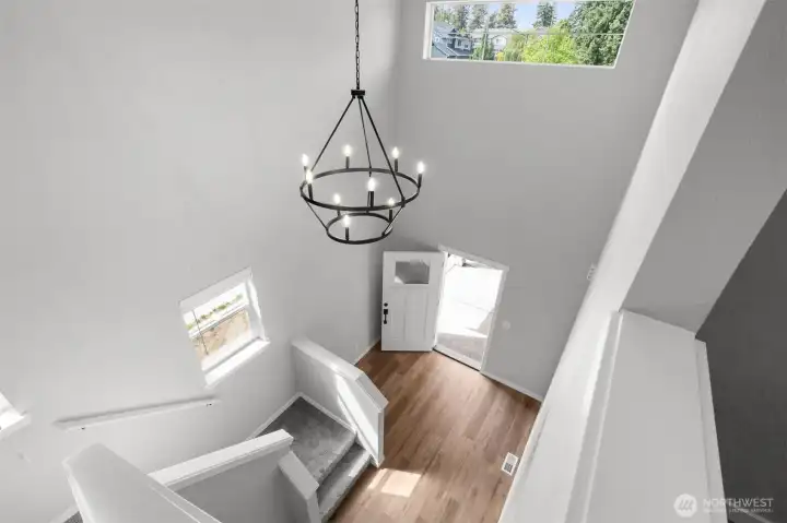 The entry way is bright and inviting, while feeling instantly spacious.