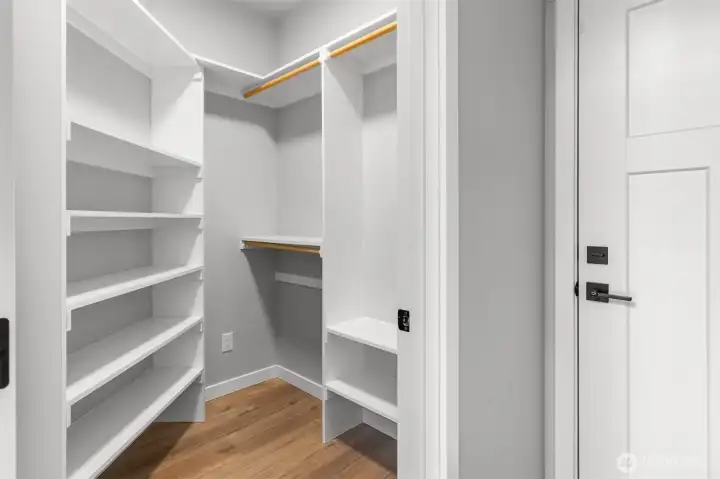 The walk in storage closet could be used for so many things, from shoes to coats, to more pantry storage- you decide!